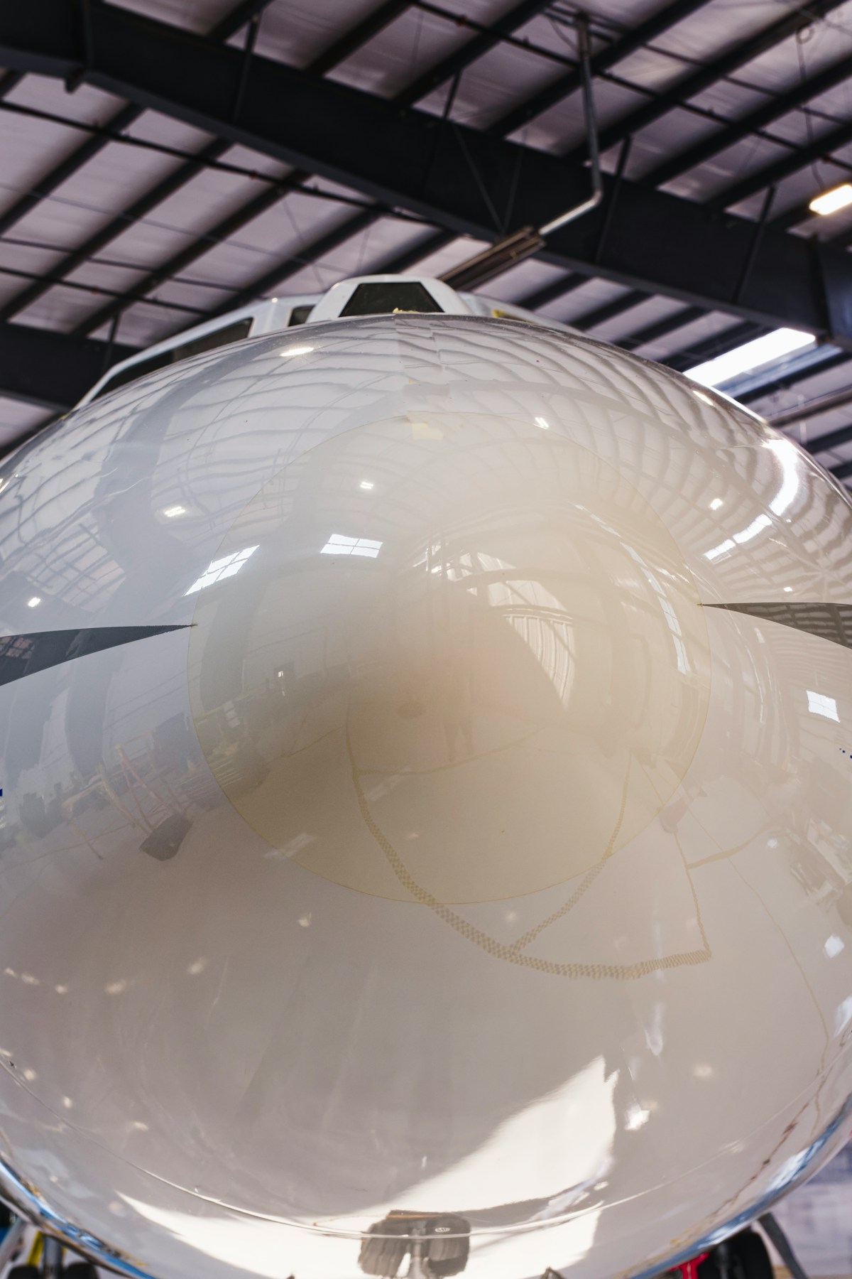 Aircraft nose in hangar